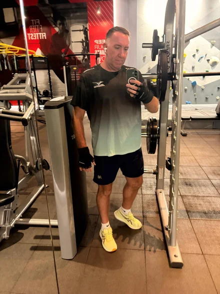 Ben Fidge taking a photo during a gym training session